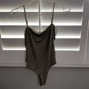 dark green body suit